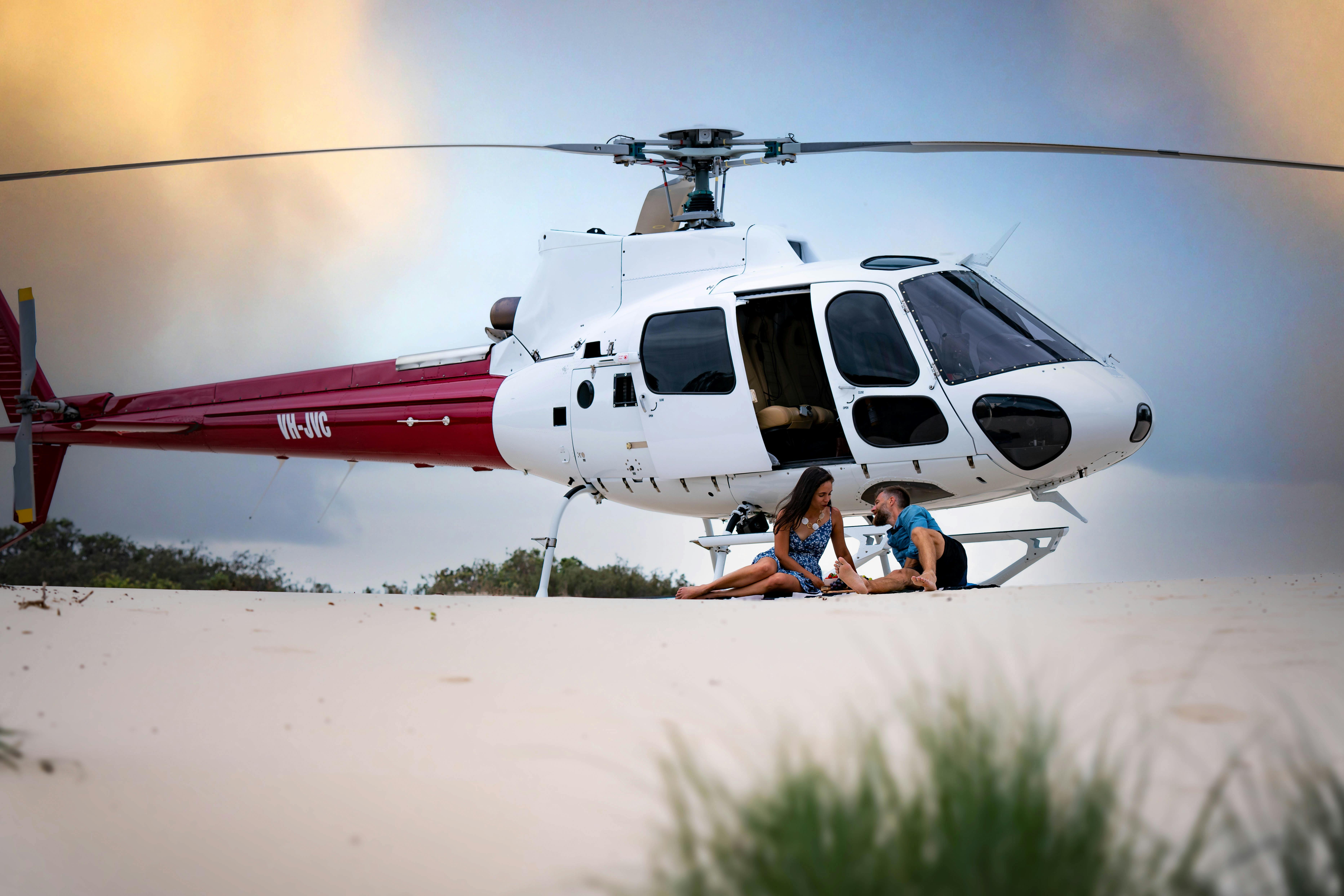 Private beach picnic with the Airbus H125 helicopter in the background