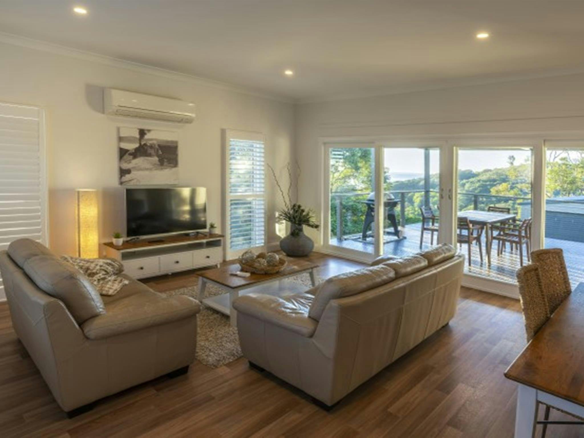 The lounge and dining room in Baileys Cottage, Glenrock State Conservation Area. Photo: John Spencer