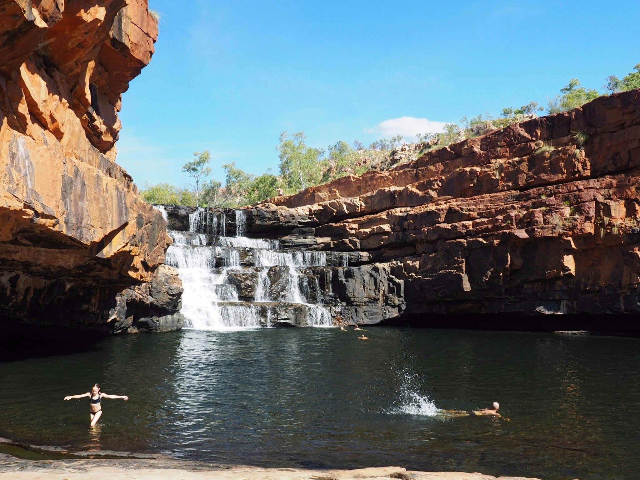 Charter North groups swimming at Bell Gorge waterfalls in The Kimberley               he Kimberley