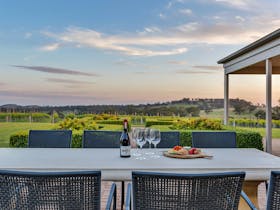 Views over the vineyard from Simon Tolley Lodge's outdoor dining area