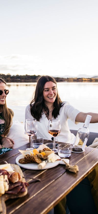 Three women taking a selfie on a boat