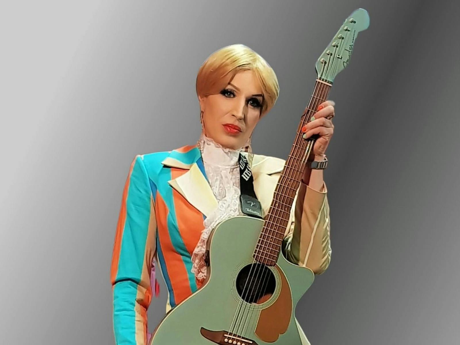 lady artist dressed like David Bowie