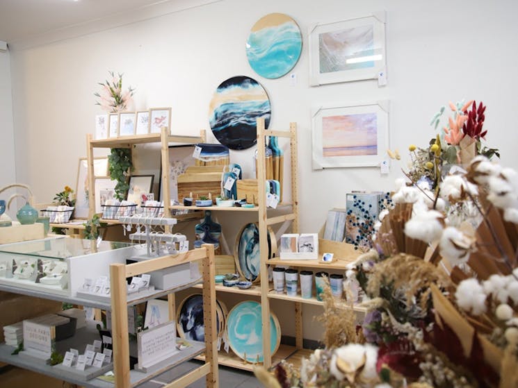 interior of the collective beat huskisson store with dried flowers and resin art