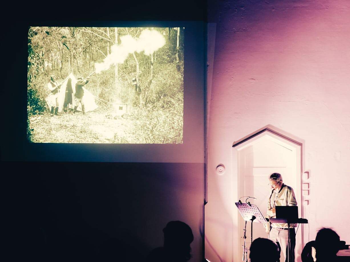 Pictured is Phillip Johnston performing with his saxophone