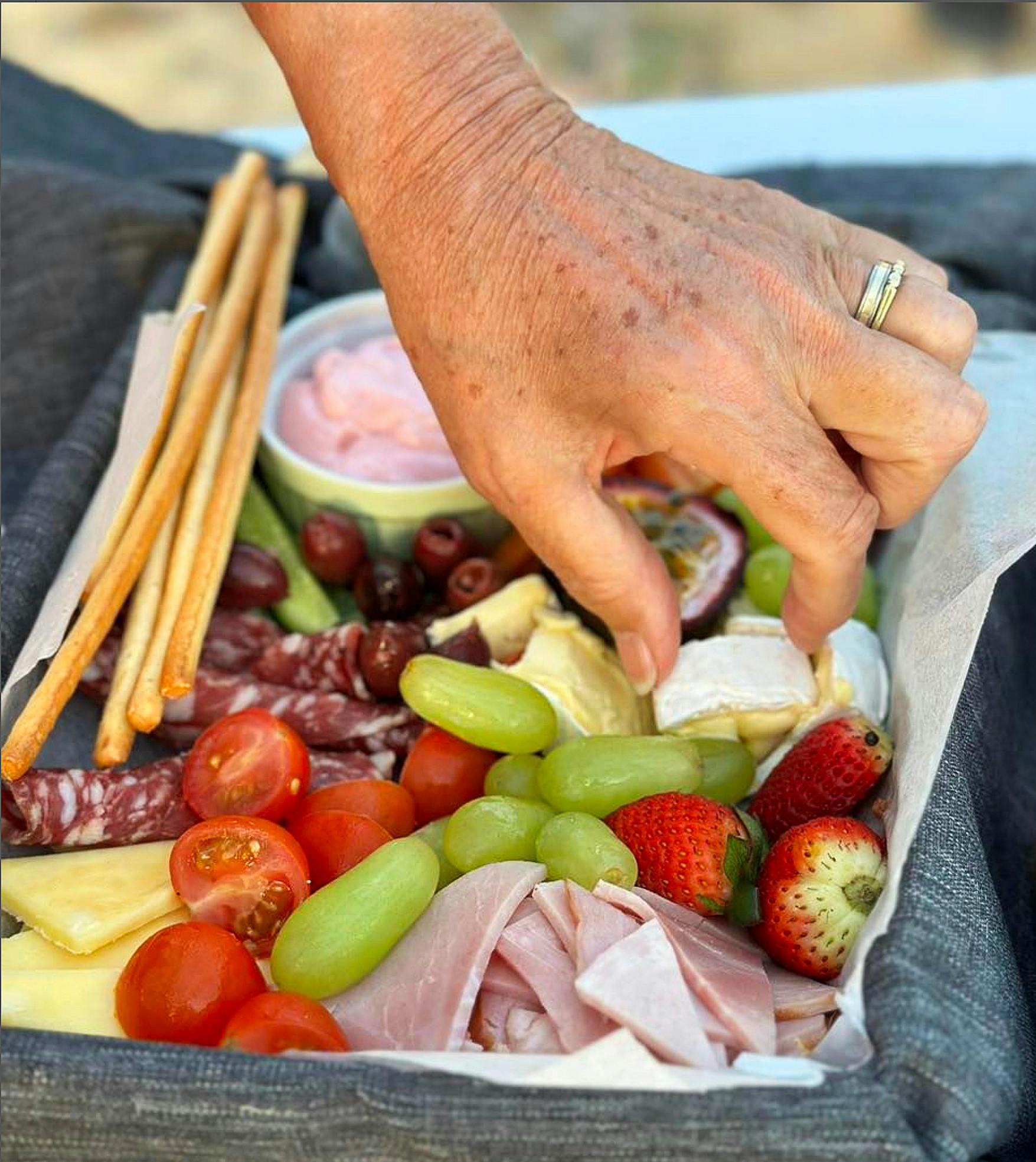 A tasty shared platter awaits at your West Point Sunset destination.
