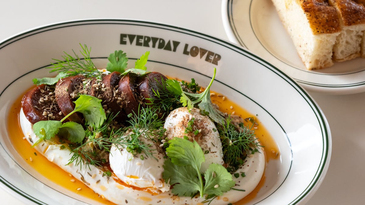 Best brunch in Cairns. Our Turkish Eggs with sujuk, labneh, herbs and homemade foccacia.