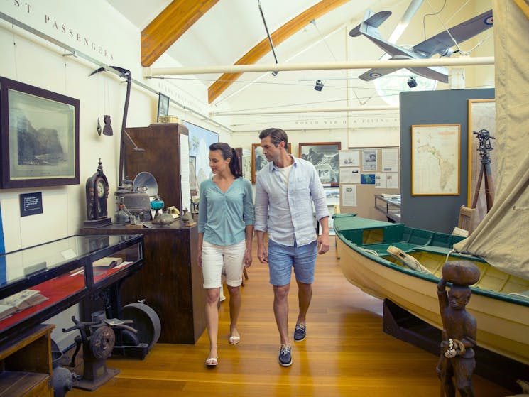 Couple viewing the historic artifacts major collection on a visit to the Lord Howe Island Museum