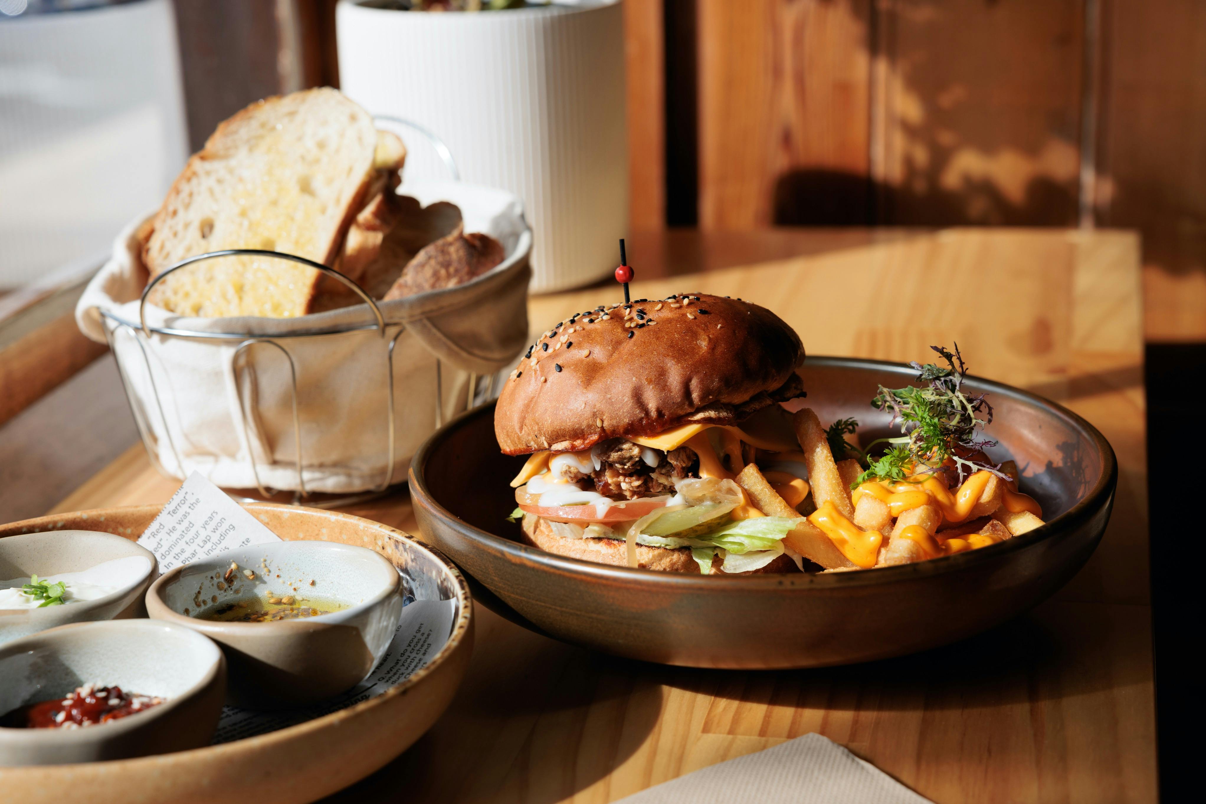 Image of tabletop with menu item Delhi Burger