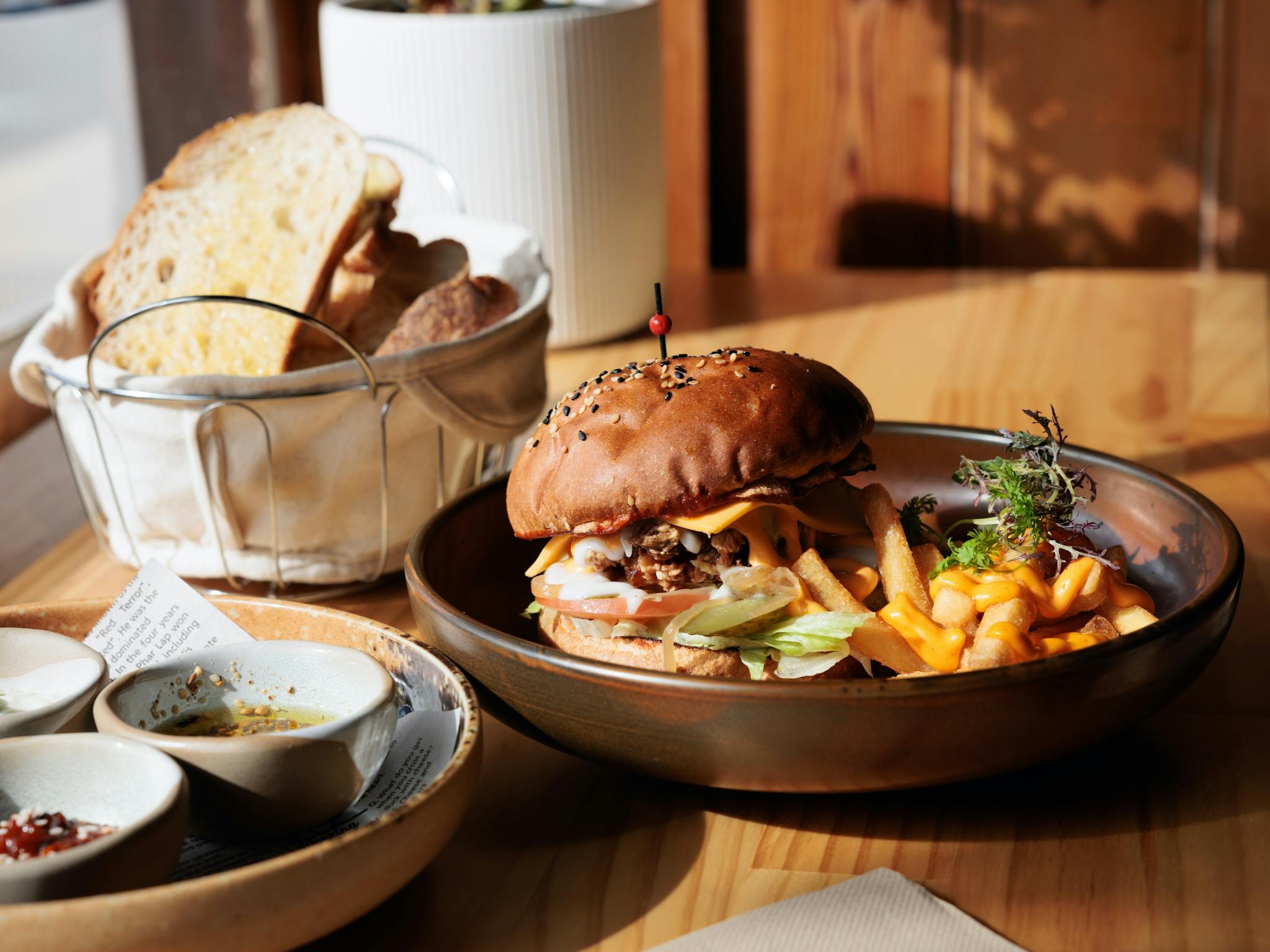 Image of tabletop with menu item Delhi Burger