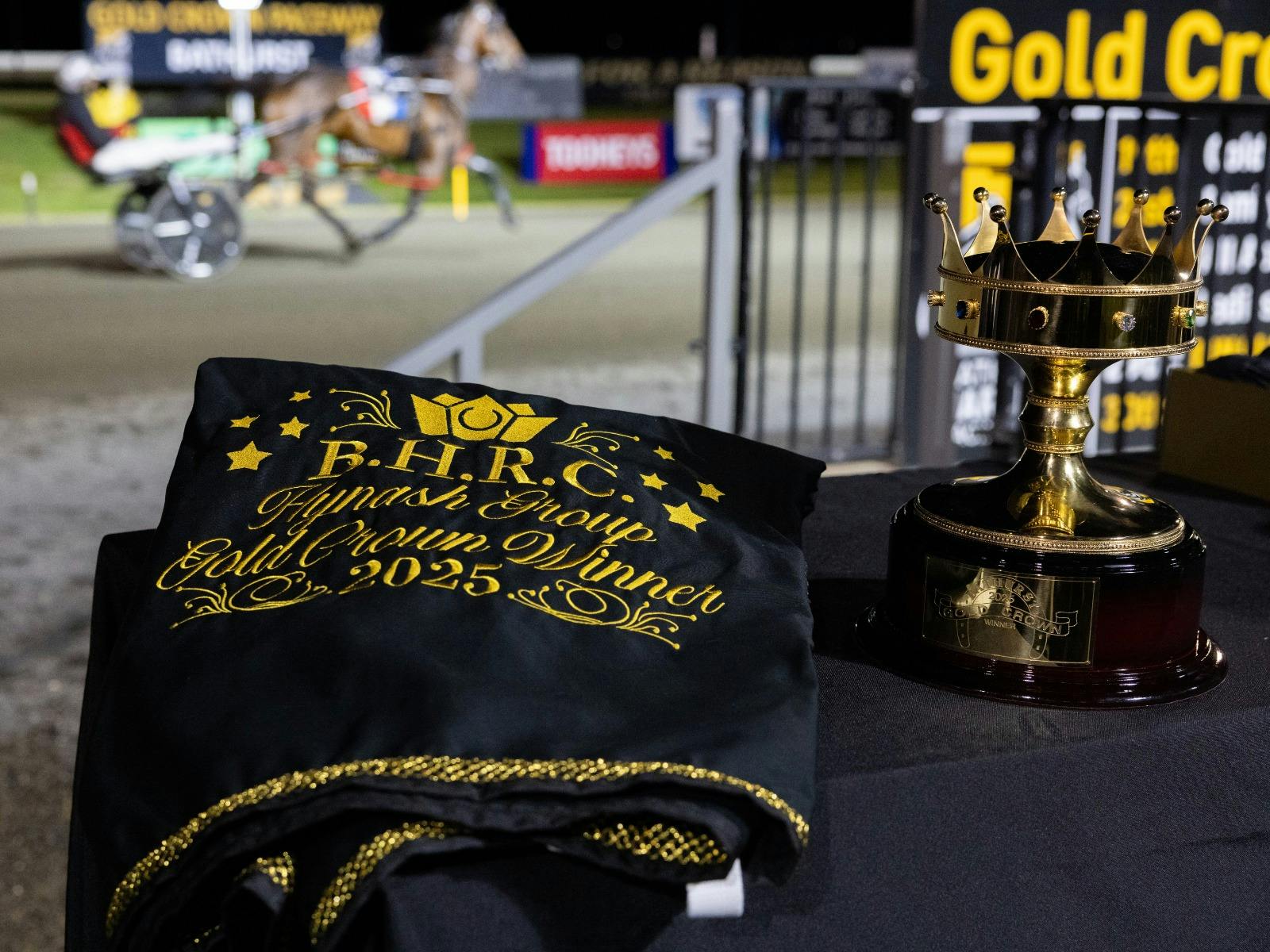 Winning Gold Crown Rug and Trophy
