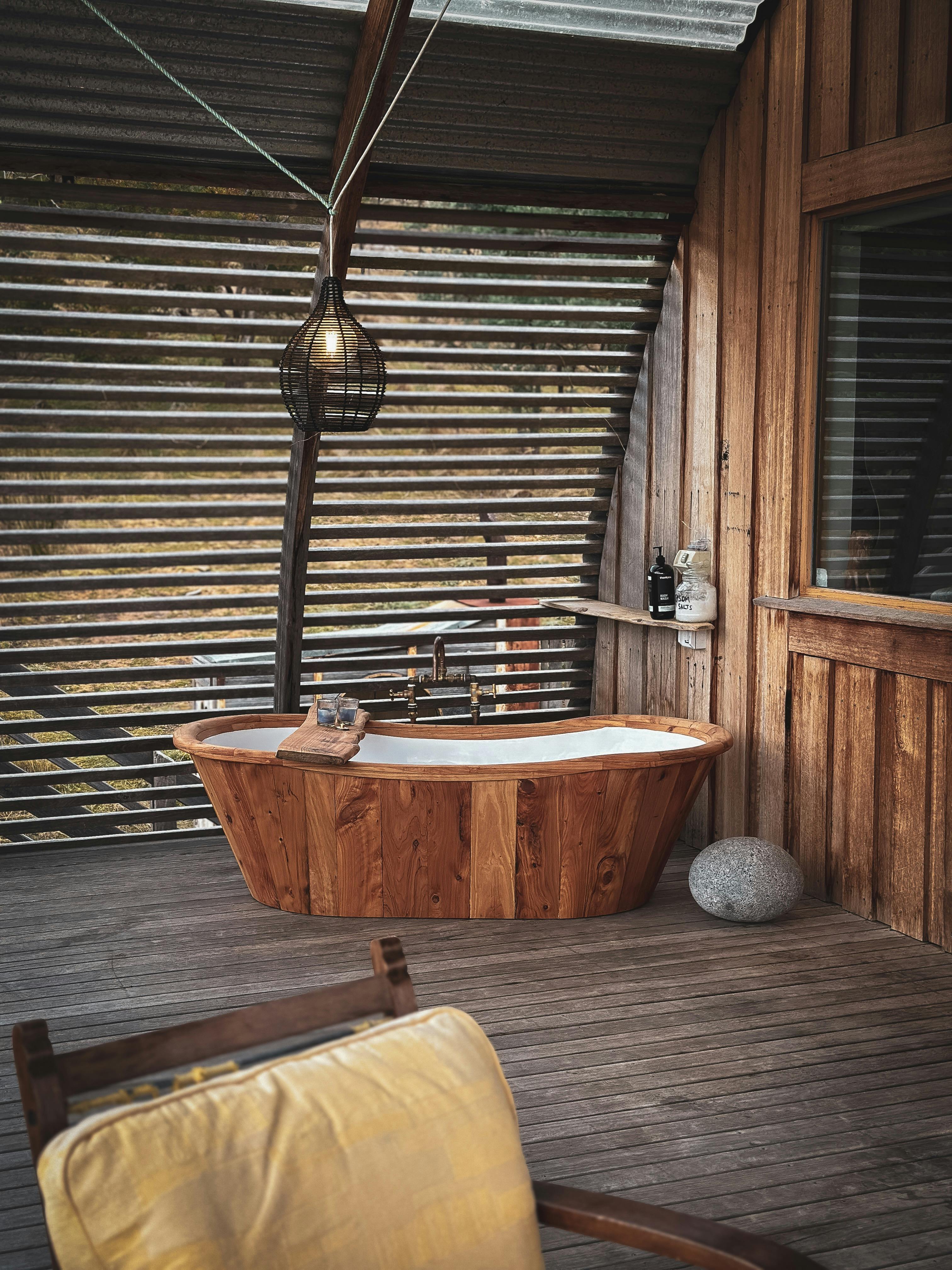 Bathing outside in a wooden tub being serenaded by the dawn or dusk chorus