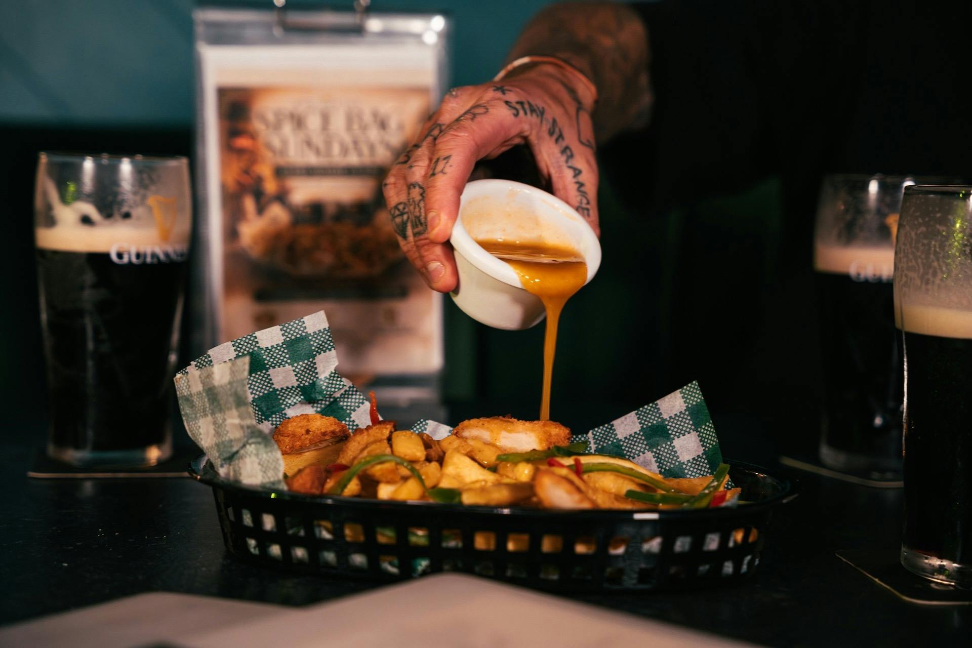 McDonnell's Curry Sauce poured over spice bag
