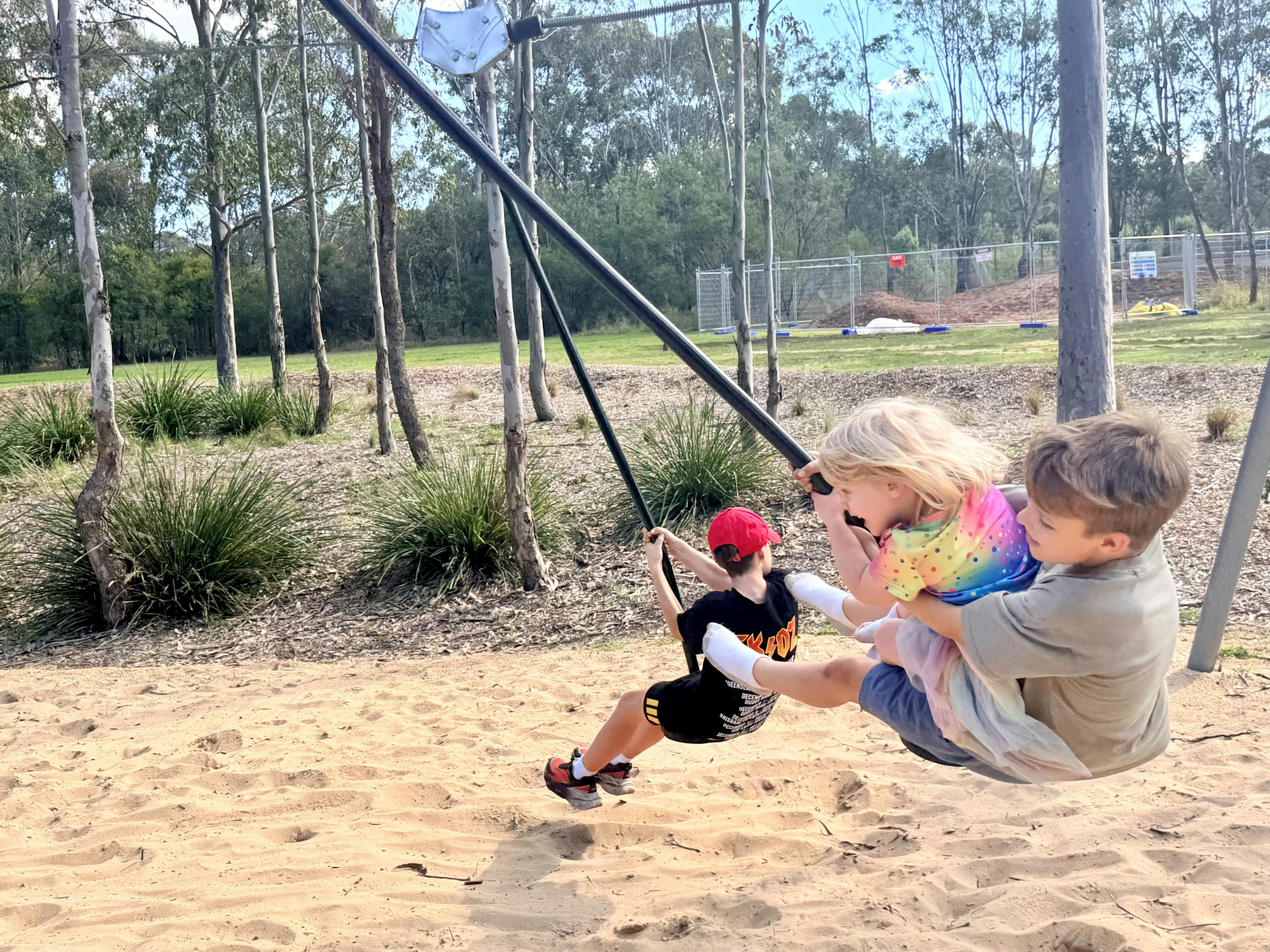 Children enjoying Lizard Log playground at Wester Sydney Parklands
