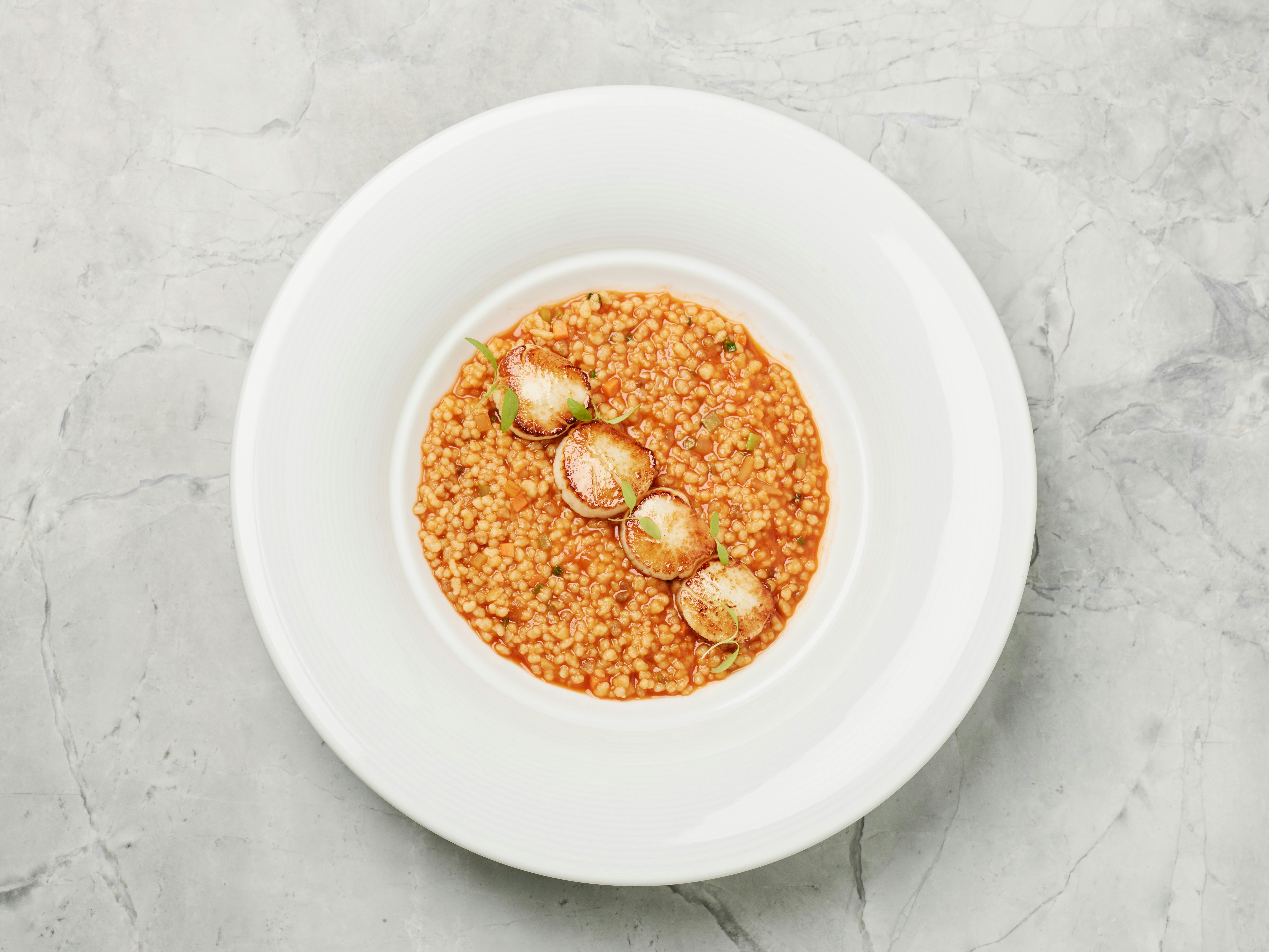 Fregola, lobster emulsion, barbequed scallops