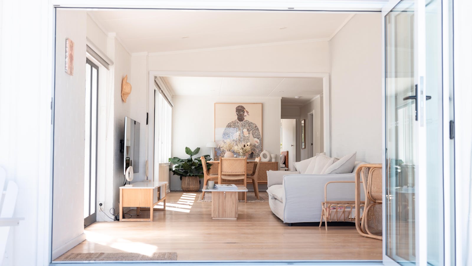 Stylish, cozy interior with open layout, inviting dining area, and modern decor