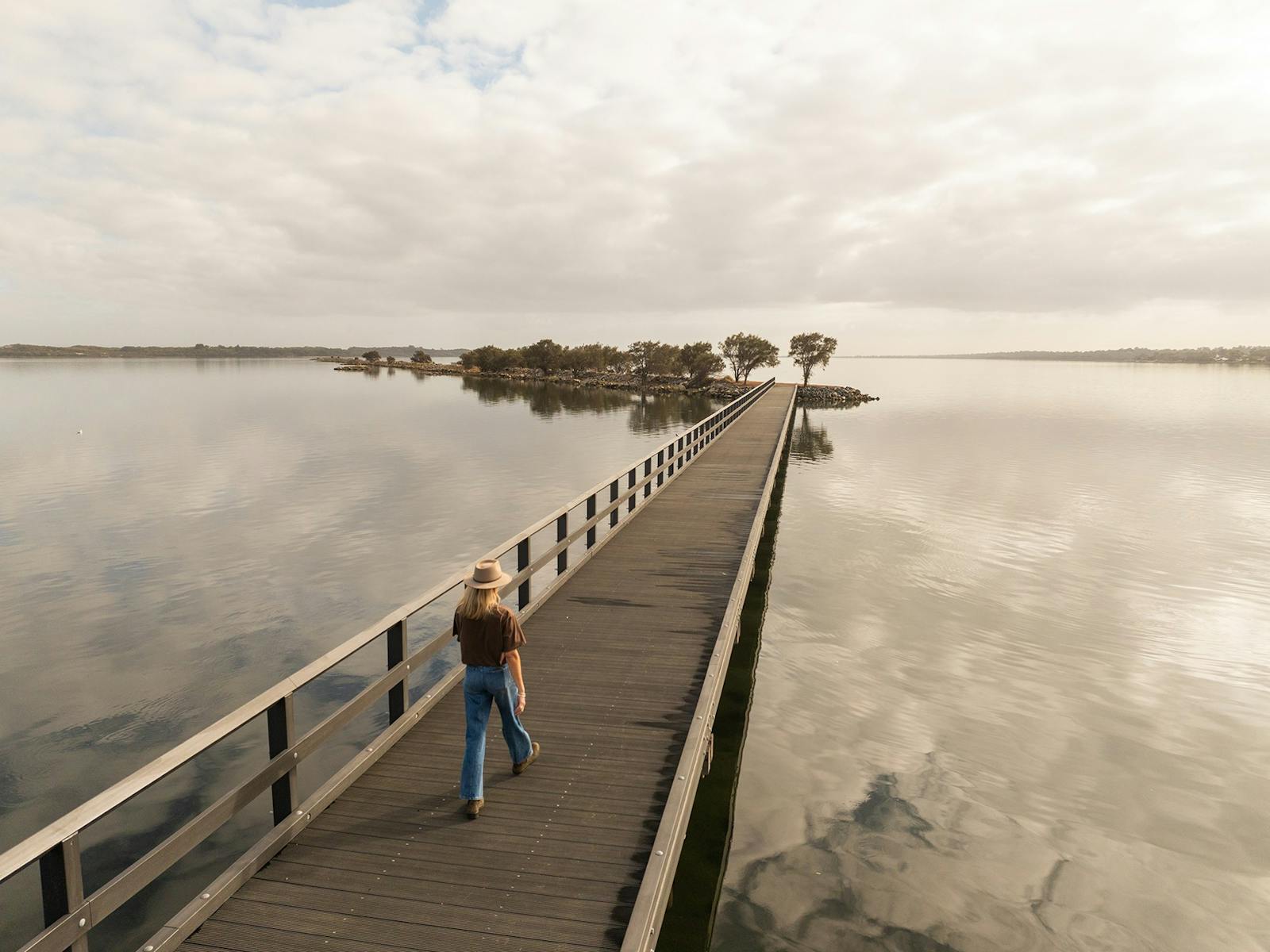 Girl walking on the Australind Jetty, Western Australia