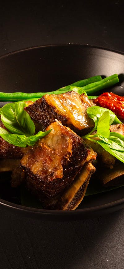 Beef Ribs Empal with sambal terasi served with green beans
