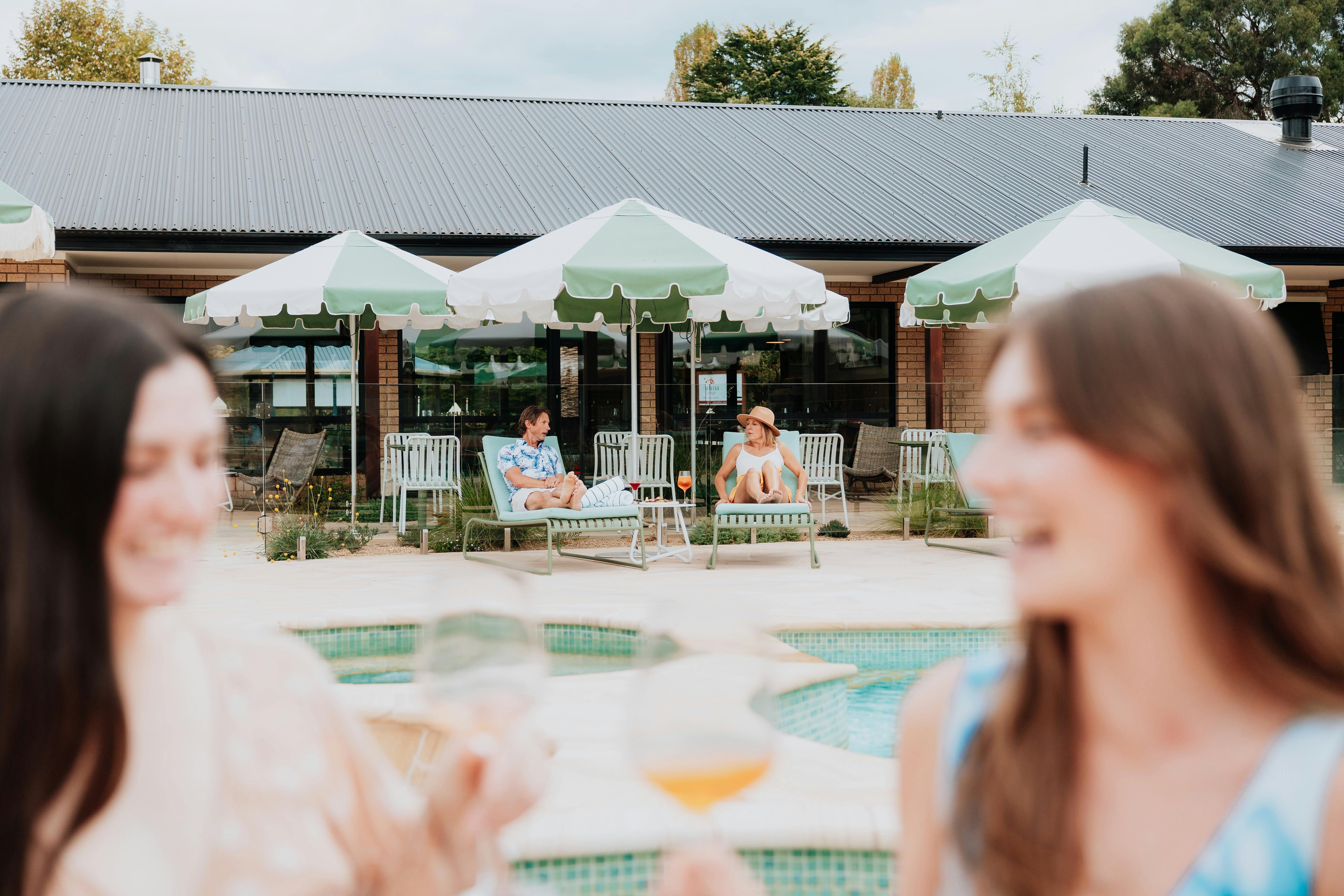 Relaxing Poolside after a adventure on the Pink Hara House Bikes.