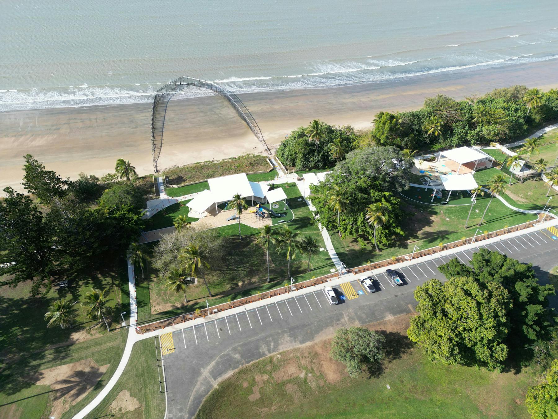 Seaforth Esplanade, swimming enclosure, ocean in the background, the carpark.