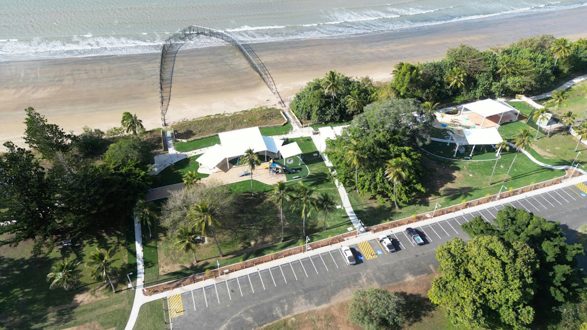 Seaforth Esplanade, swimming enclosure, ocean in the background, the carpark.