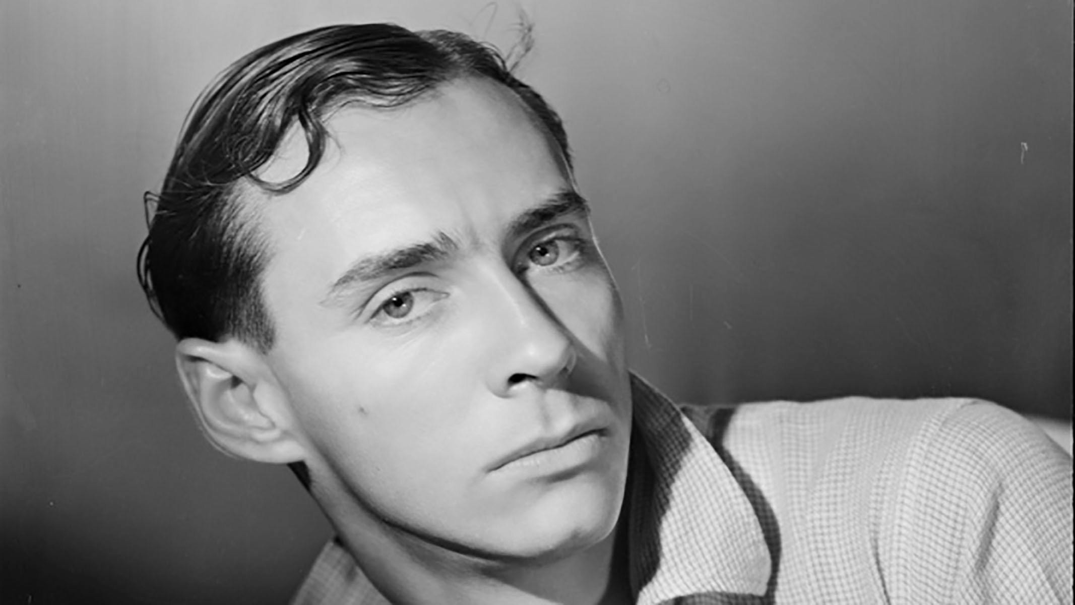 A black and white photo of a man