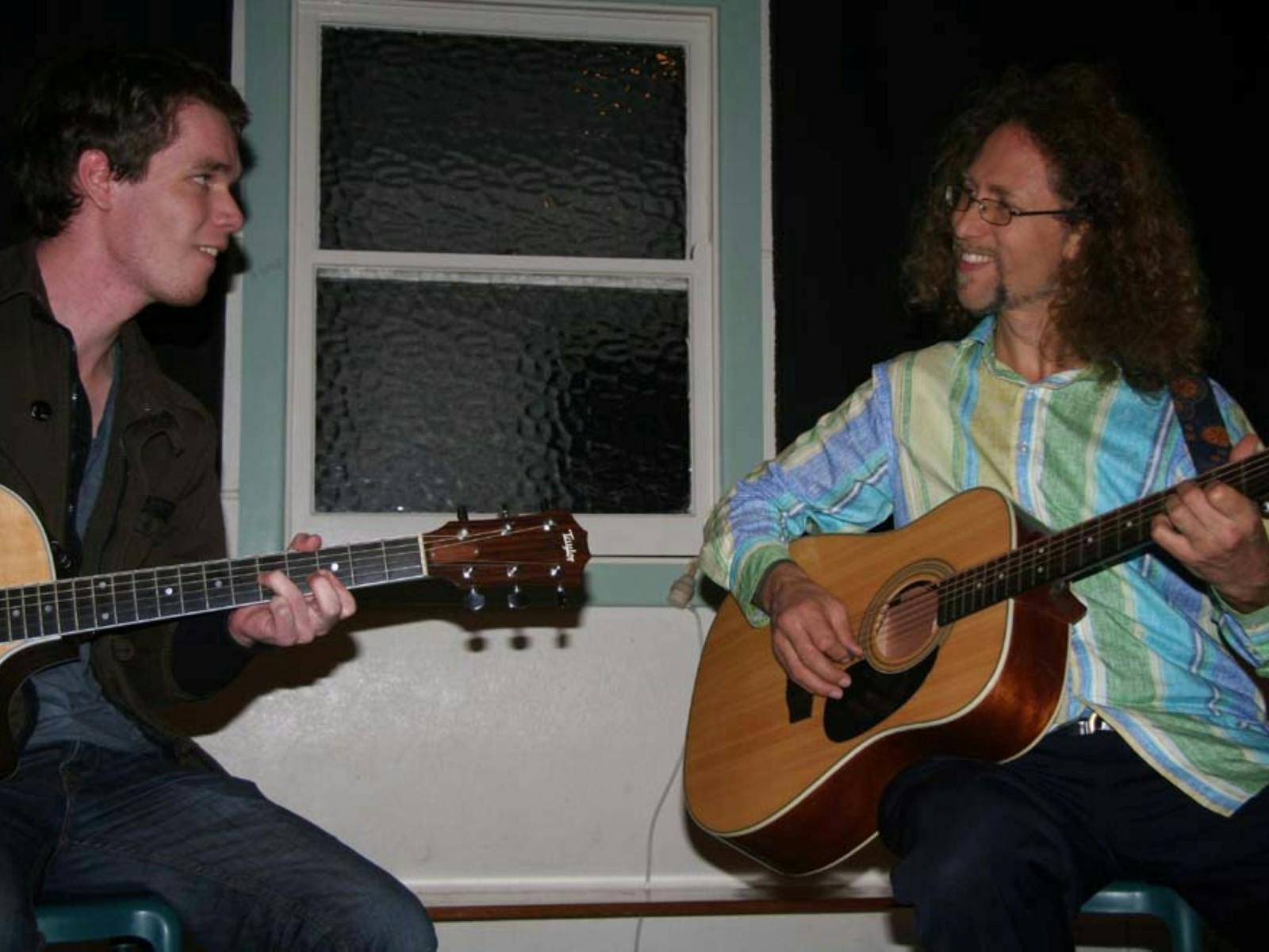 Rous Unplugged at Rous Mill Hall people playing guitar and singing
