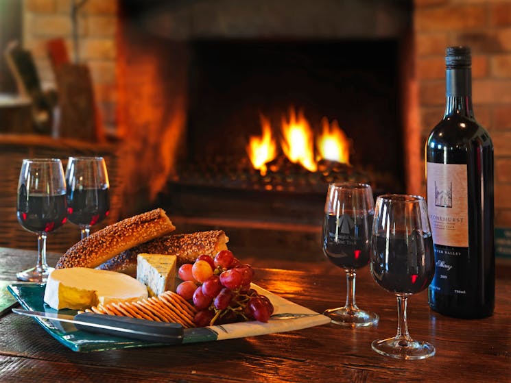 Cedar Creek Cottages wood fire, wine and cheese