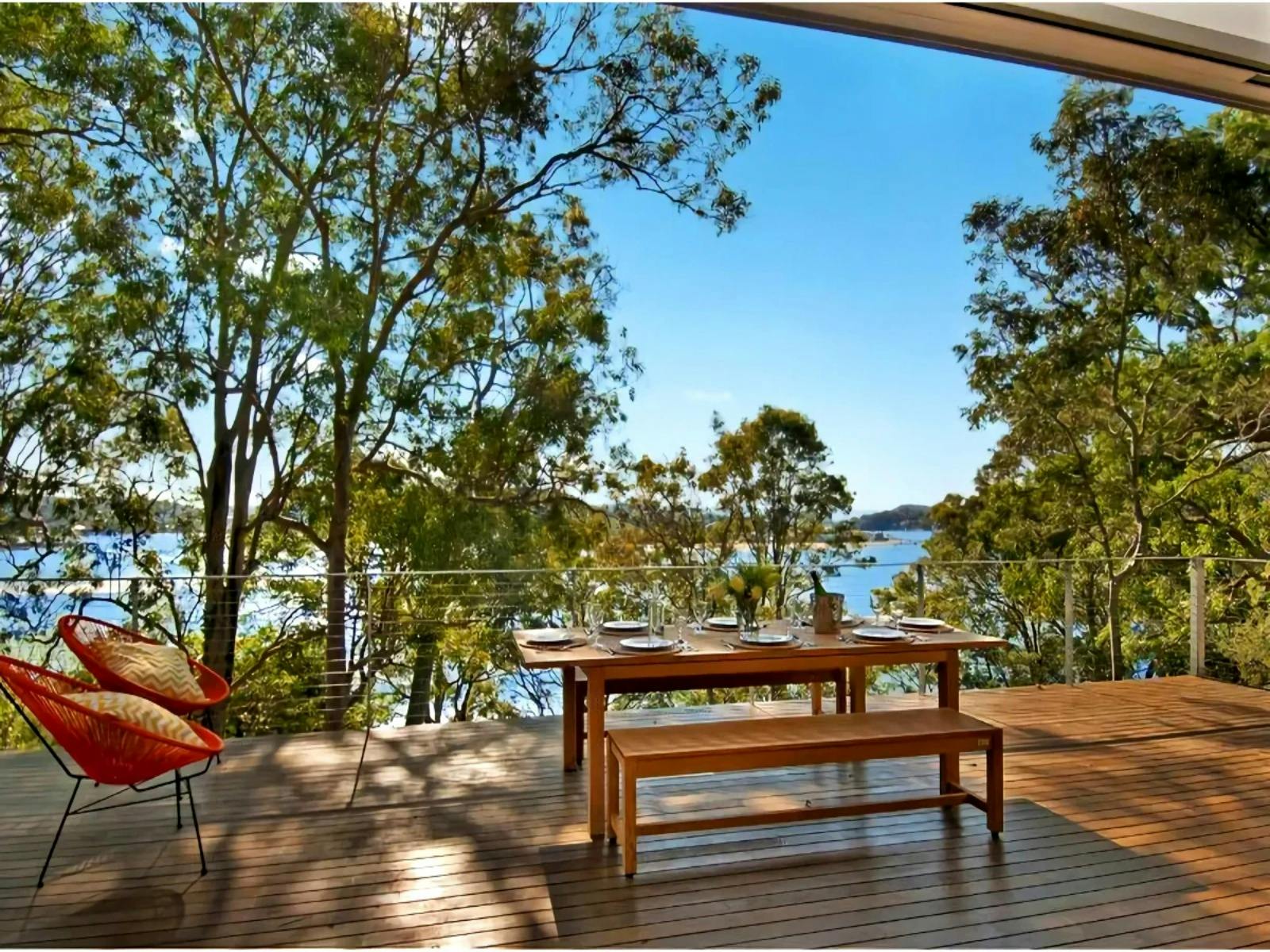 Outdoor entertainment area with 360 degree water views