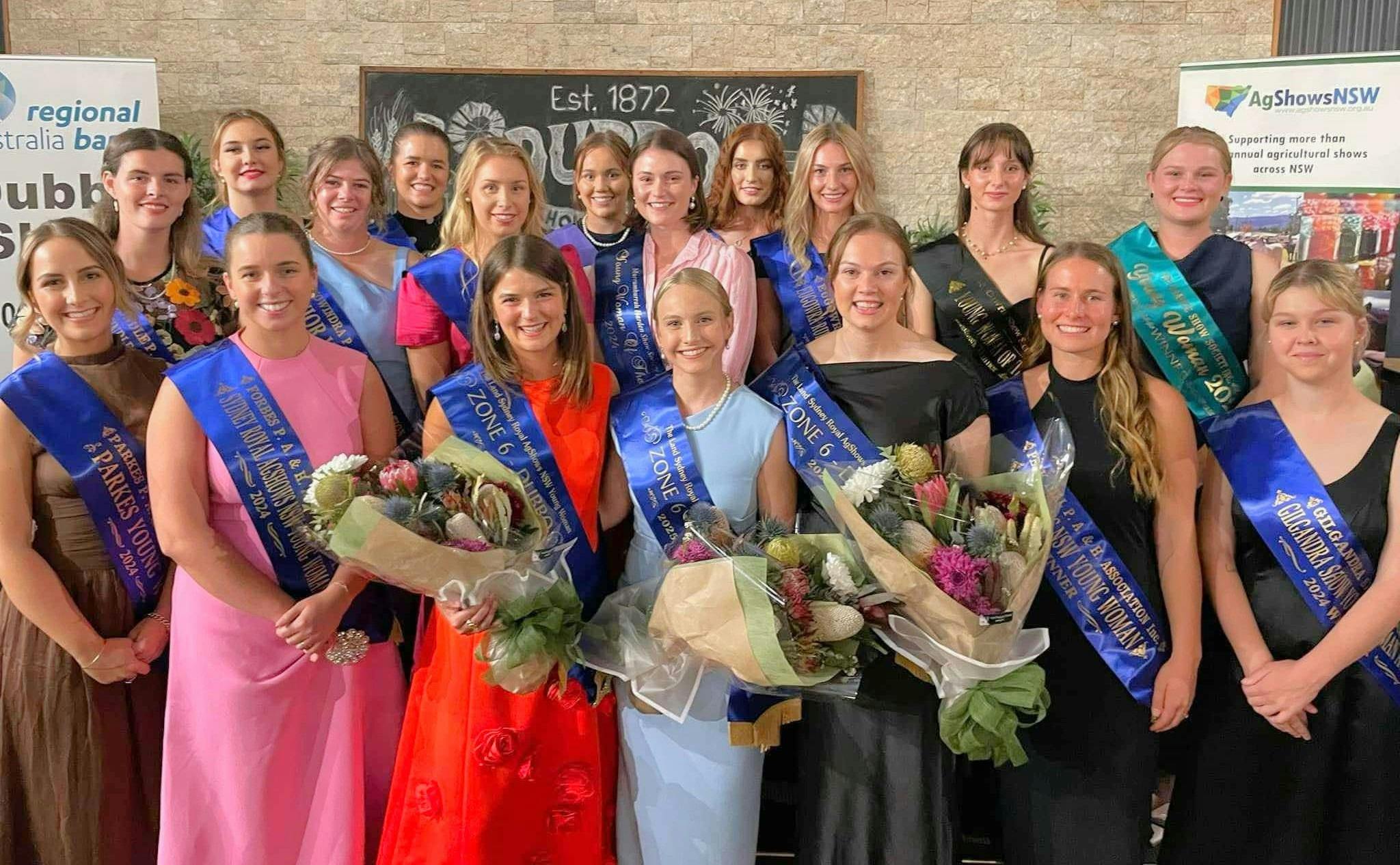 Group of participants in the Murrumburruh Young Woman Competition., all with blue sashes.