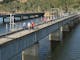 Ride the iconic rail trail bridge acroos Eildon Weir at Bonnie Doon