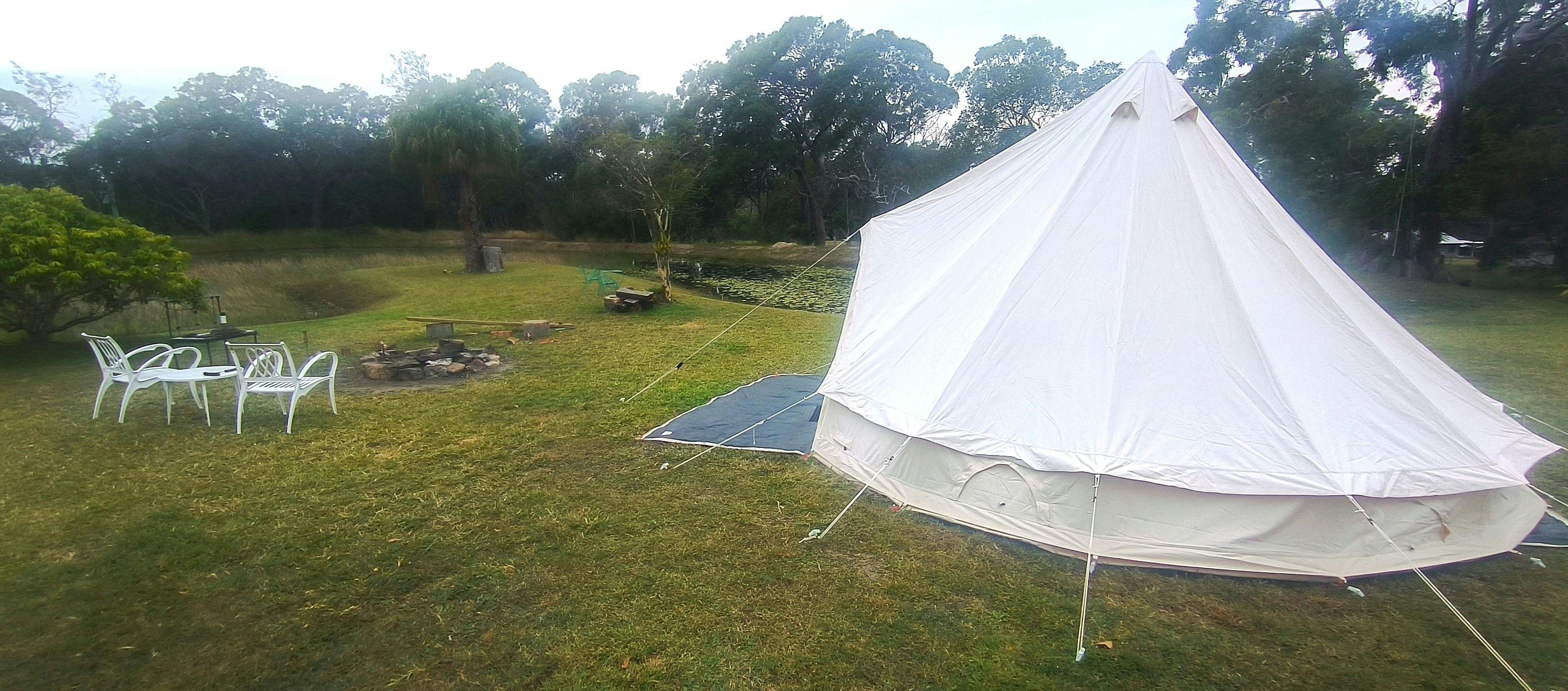 Bell Tent overlooking a dam