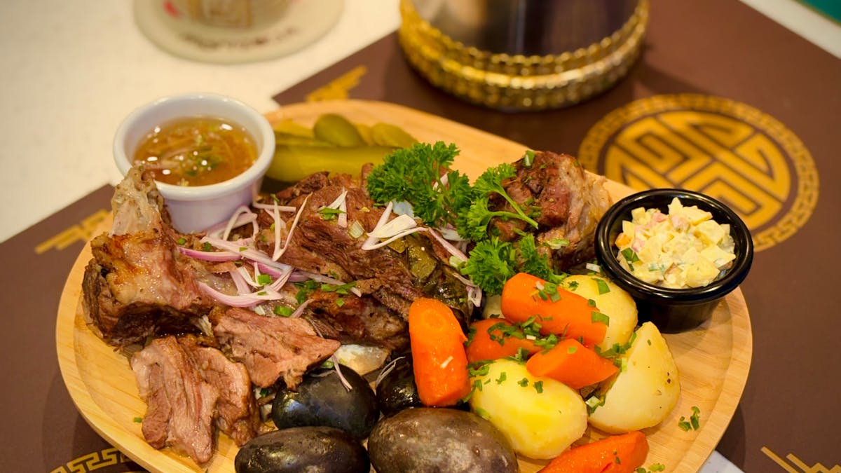 Traditional Mongolian Khorkhog dish cooked with hot stones