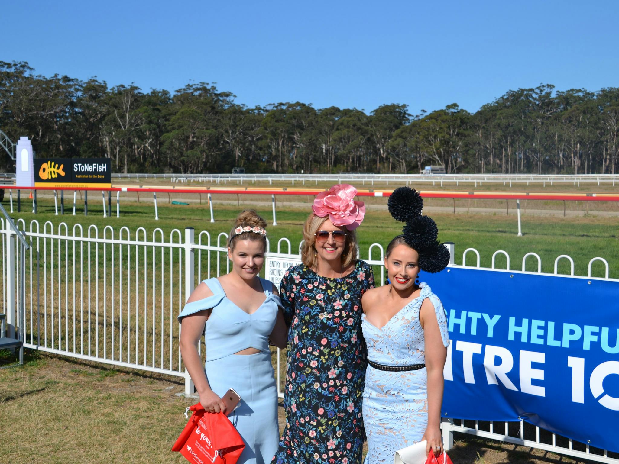 3 ladies showing off the fashions at the Moruya Race Course