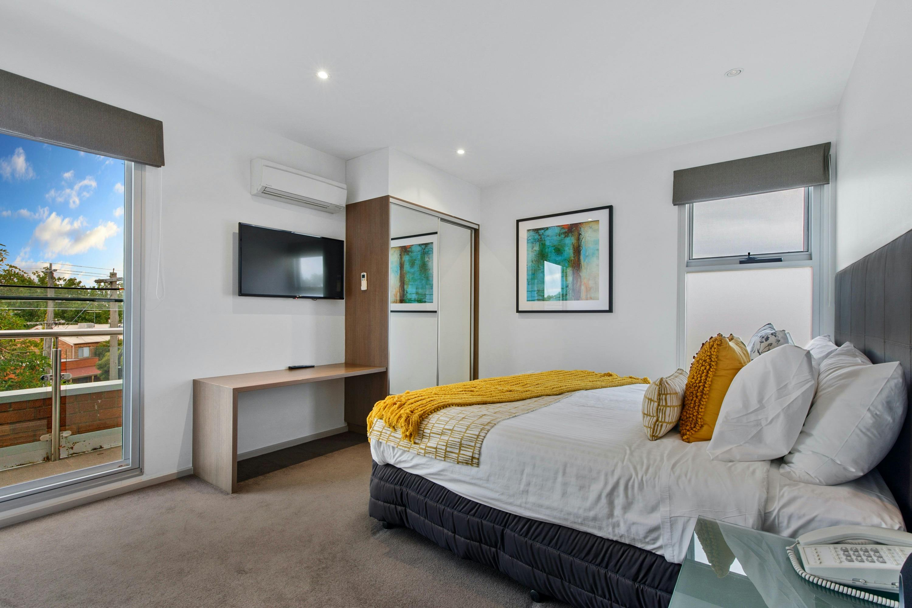 Bedroom looking out over Wangaratta CBD in Two Bedroom Apartment at The Gateway