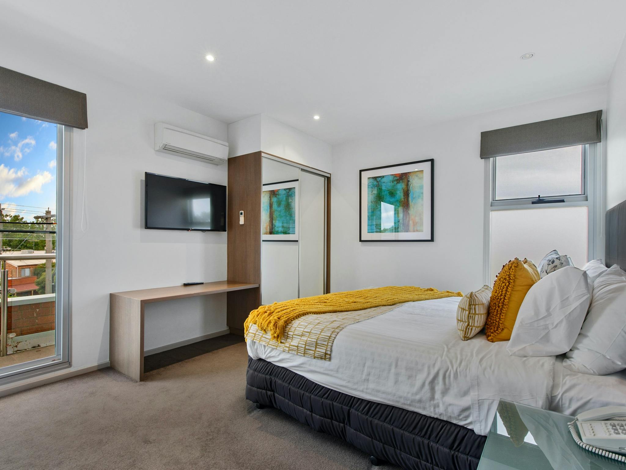 Bedroom looking out over Wangaratta CBD in Two Bedroom Apartment at The Gateway