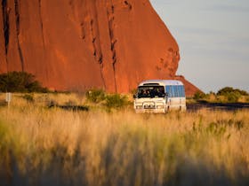 Uluru Hop on Hop off bus at the base of Uluru