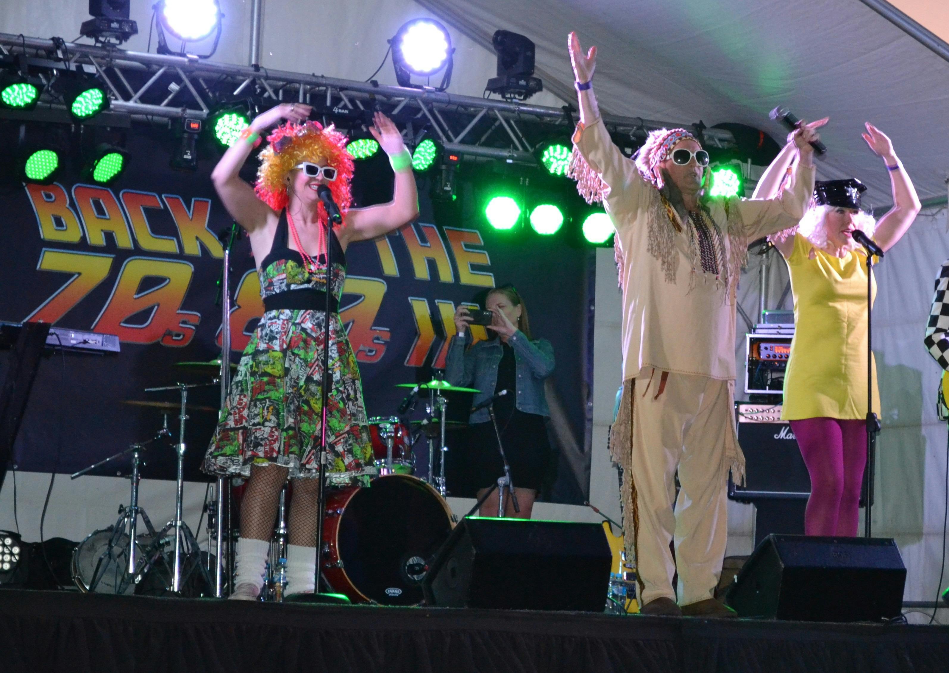 Band members of back to the 70s, 80s and 90s playing live