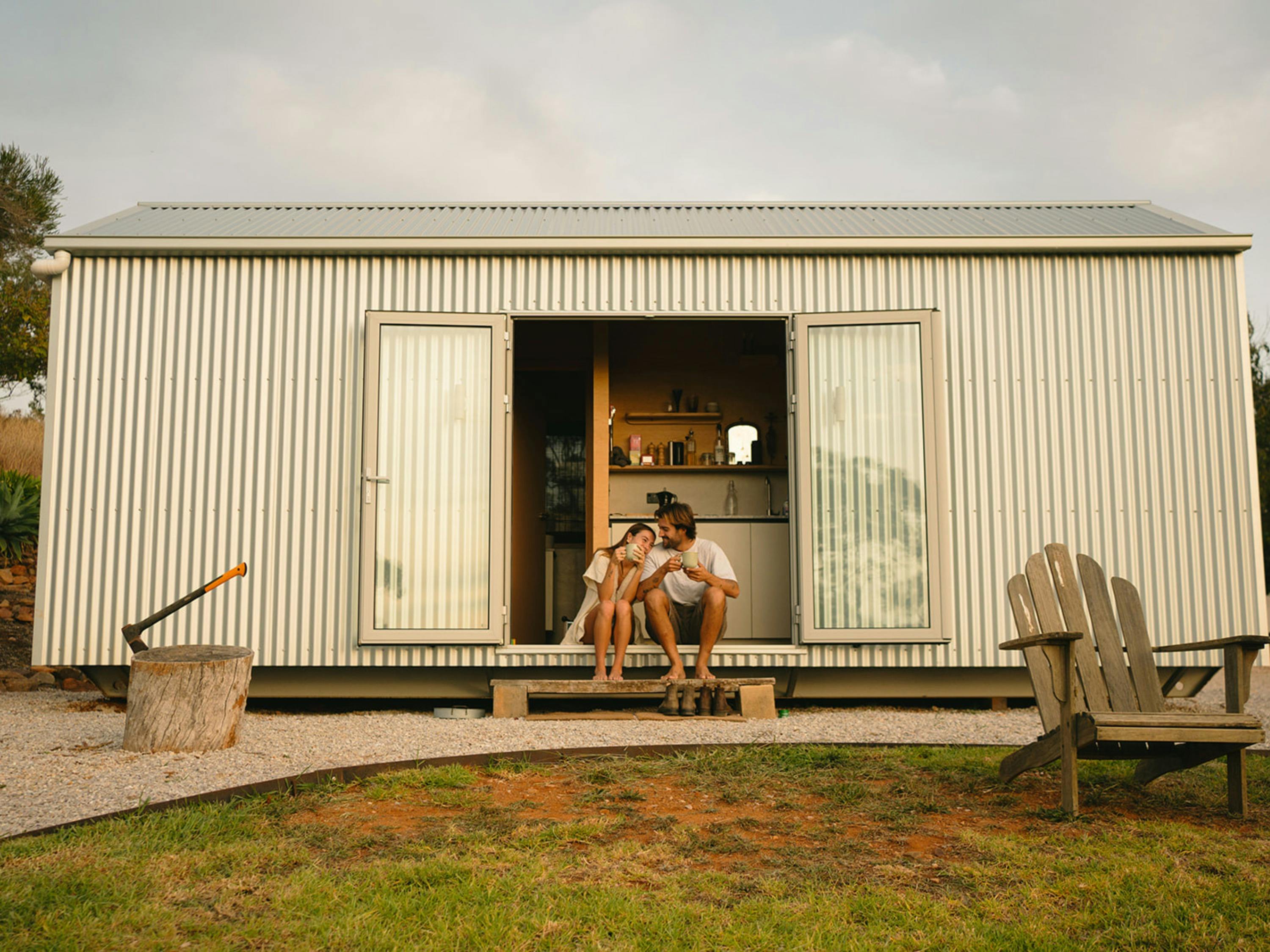 Sitting in the doorway of the cabin