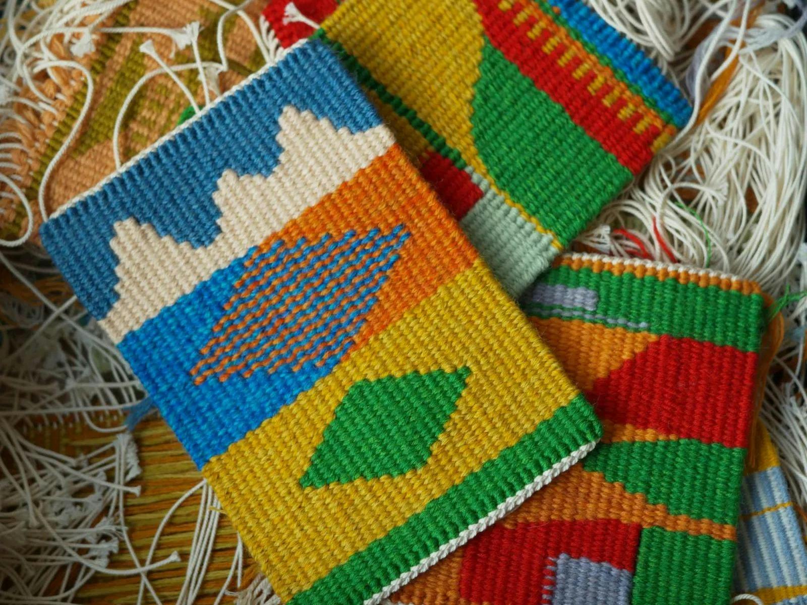 Three hand woven fabric samples
