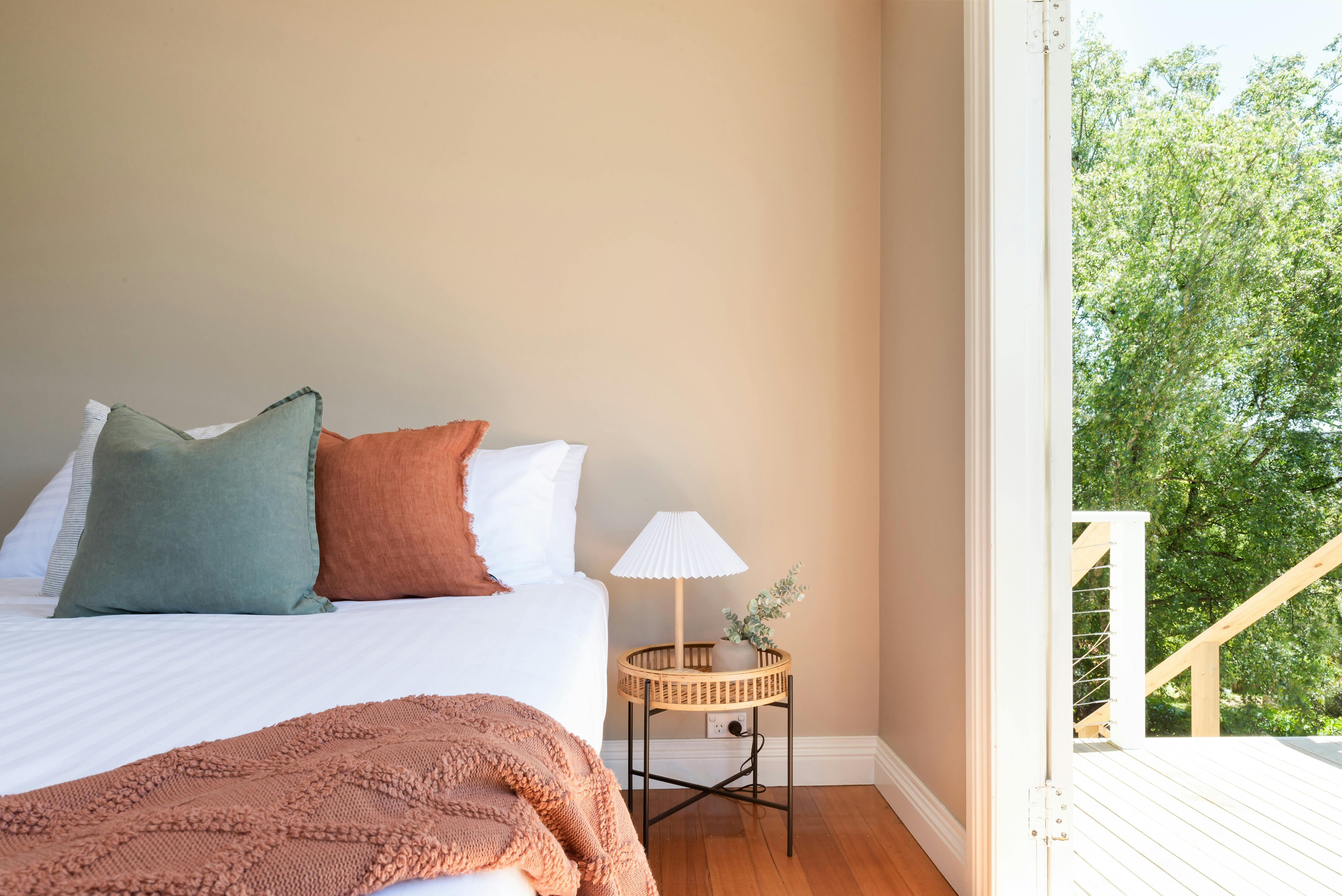 Queen bedroom with built-in storage at Gorgeous on Galvin holiday home