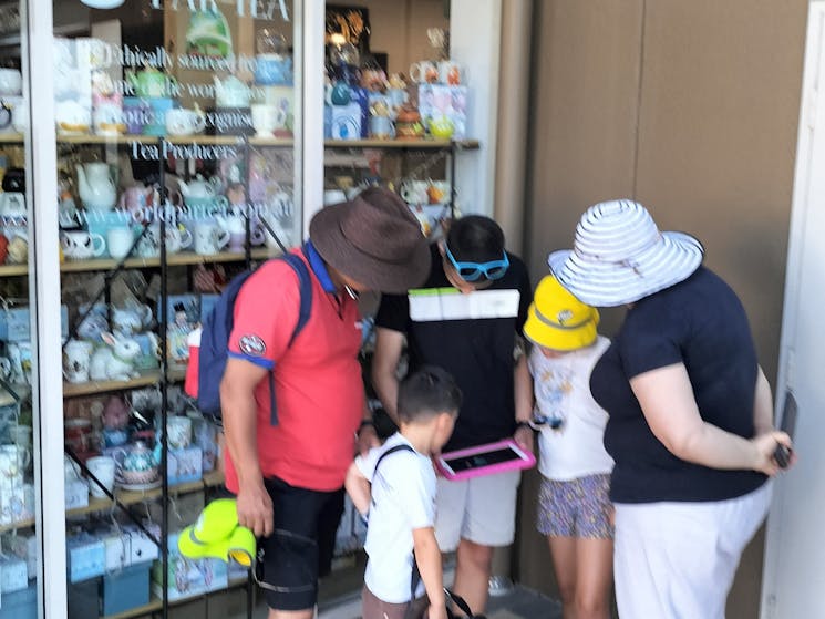 Family playing an escape game in Port Macquarie