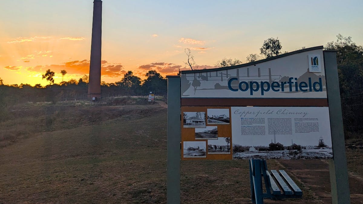 Copperfield Chimney and informative sign at sunset