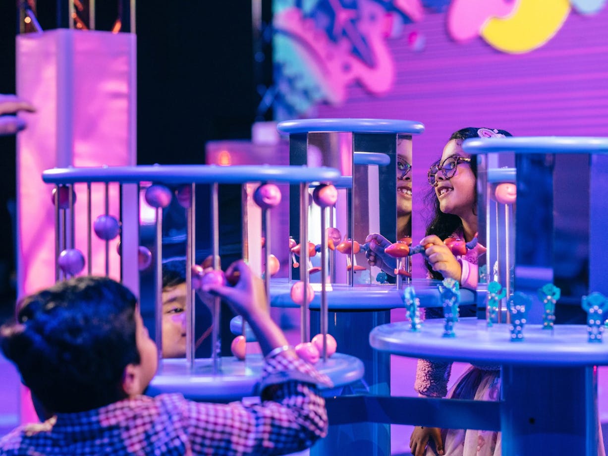 Children enjoying the Illuminate exhibition
