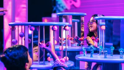 Children enjoying the Illuminate exhibition