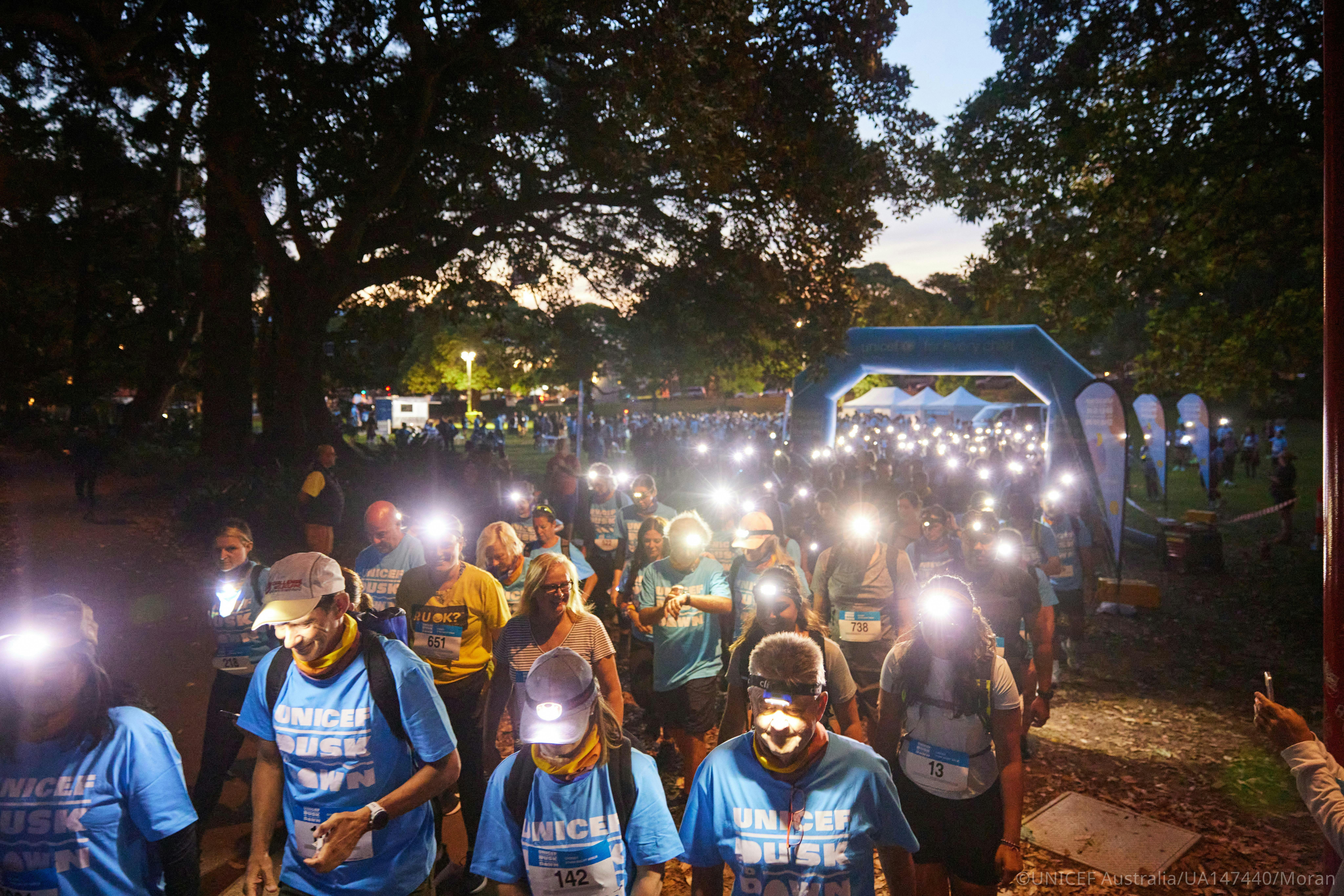 Crowd of Dusk to Dawn participants gathered during the overnight Sydney walking event.