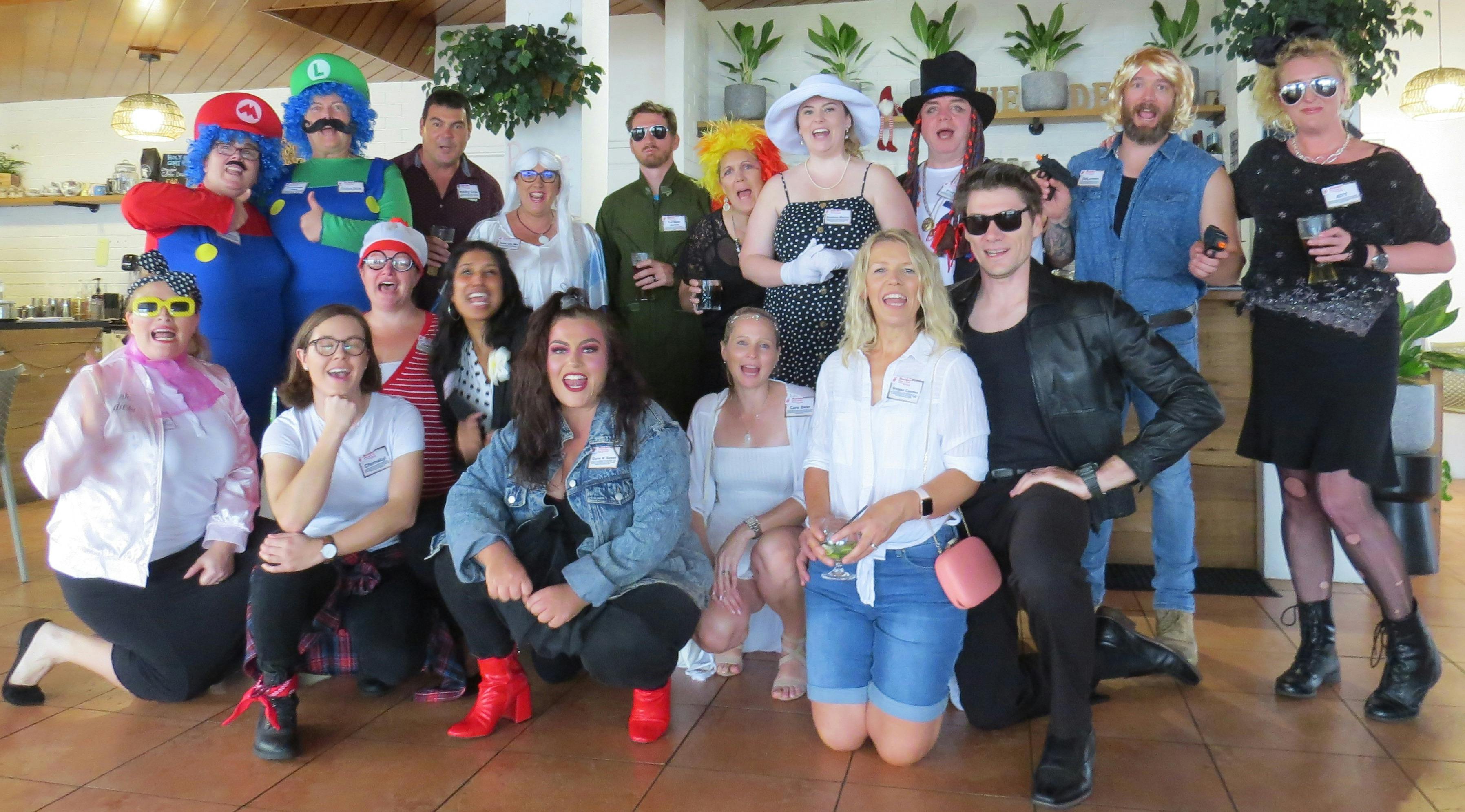Group shot of suspects dressed as icons of popular culture
