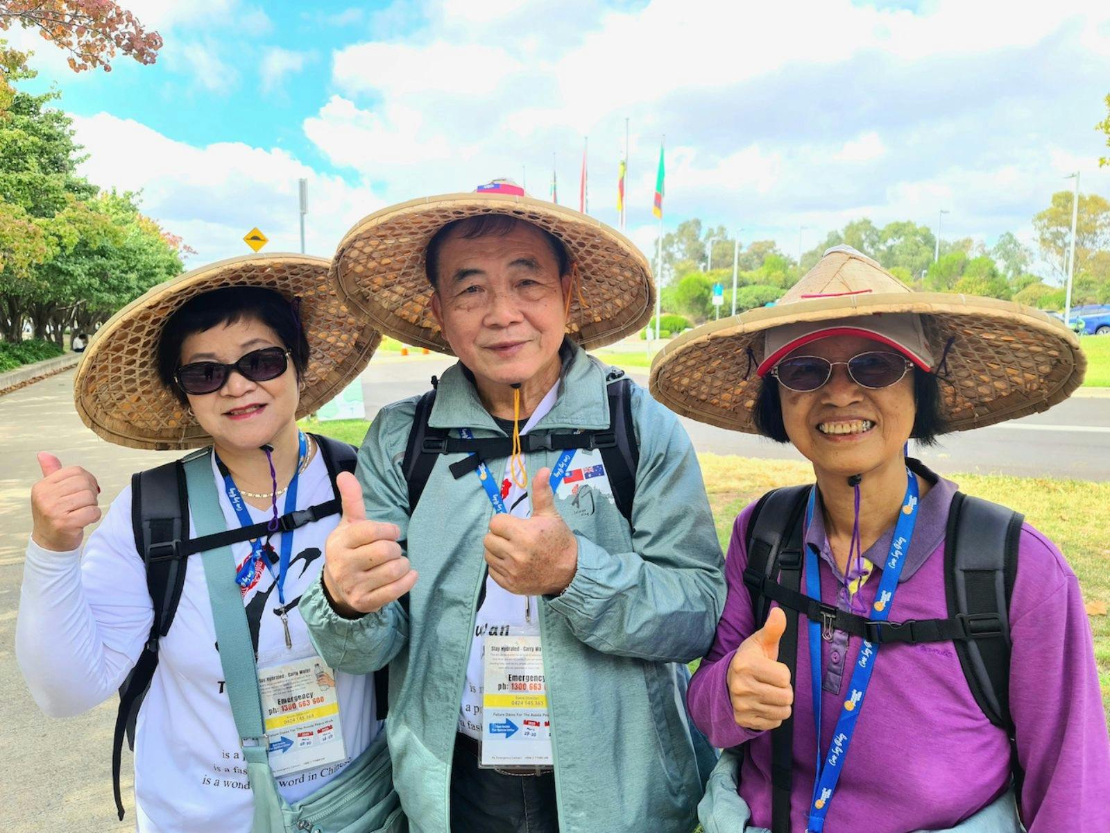 3 taiwanese women wearing traditional hats