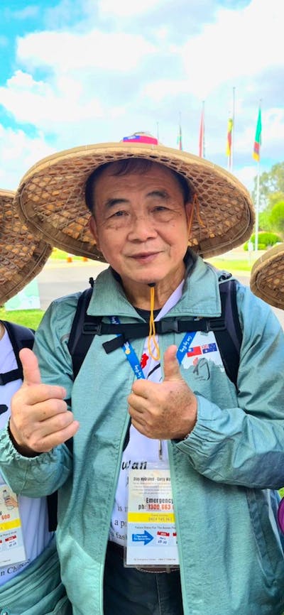 3 taiwanese women wearing traditional hats