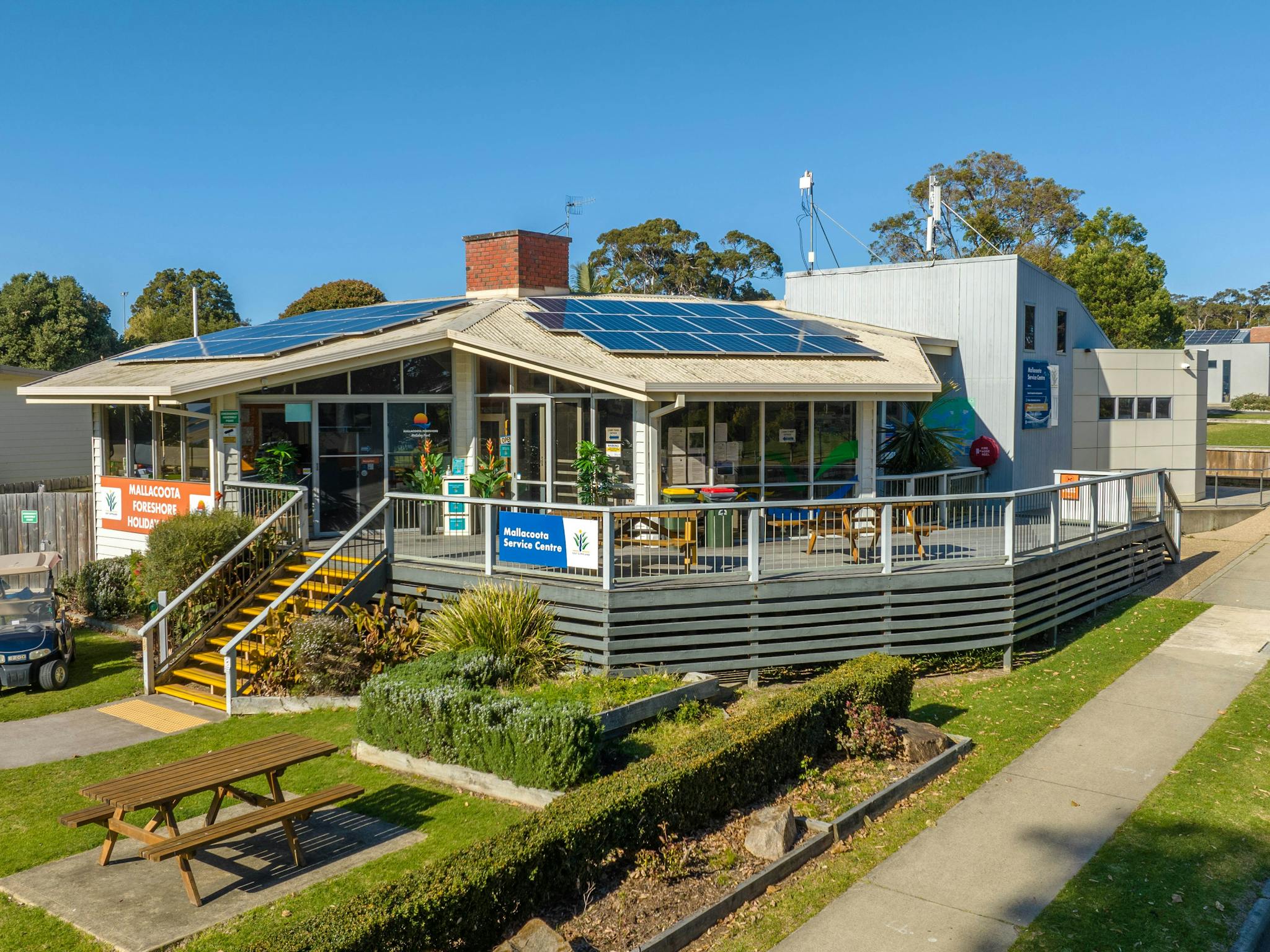Main office sitting on the corner block with stairs leading to door