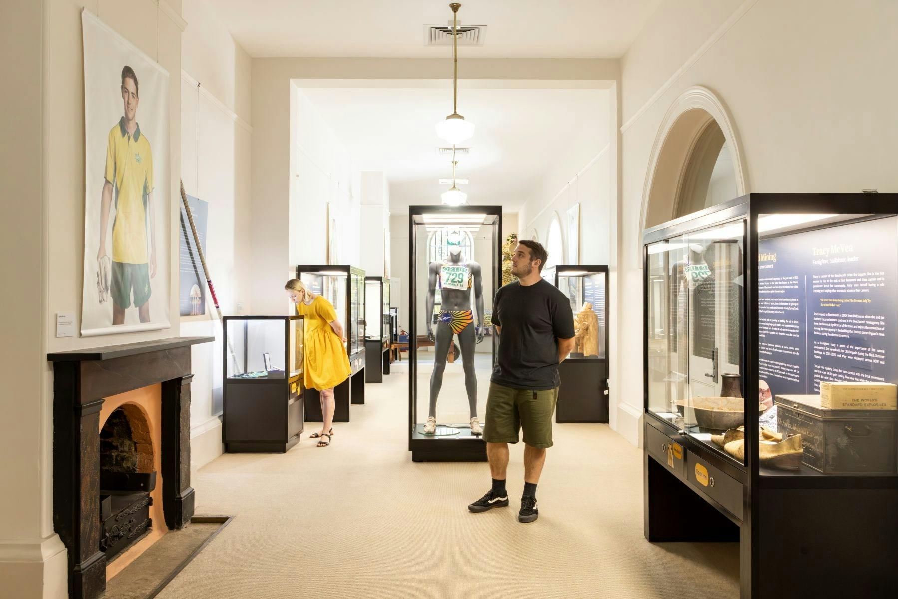 a couple exploring an exhibition at the Burke Museum
